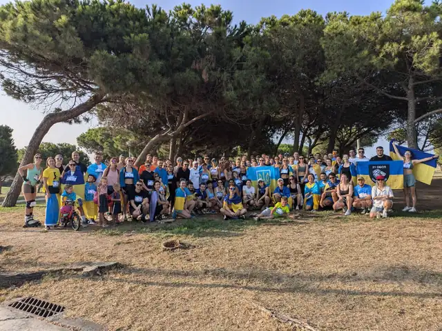 Club members with Ukrainian flags after a run